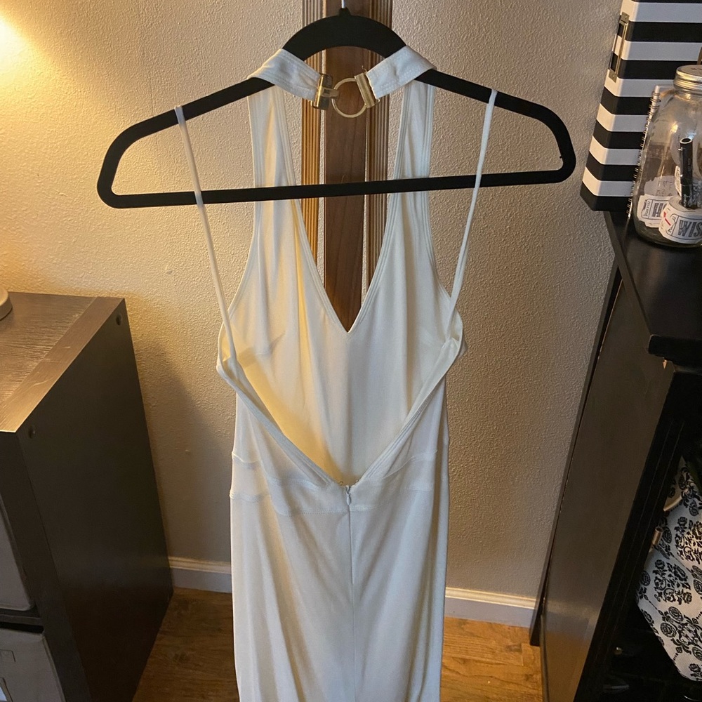 Designer dress, worn for photo shoots and events. Jersey cut.